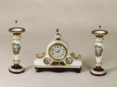 candelieri e orologio da tavolo ceramica avorio