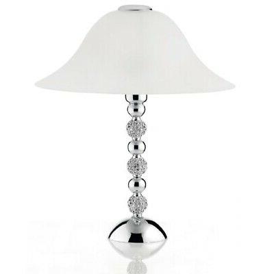 lampada da tavolo in resina argentata con