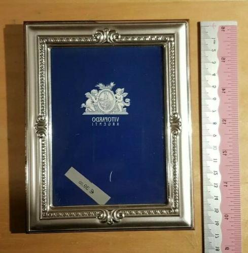 portafoto generico in argento da tavolo foto