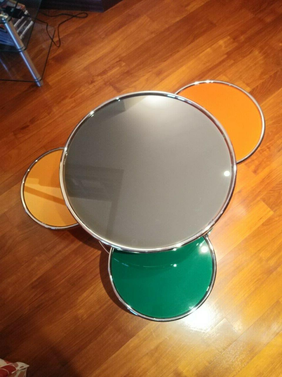 tavolino in acciaio lucido e cristallo di