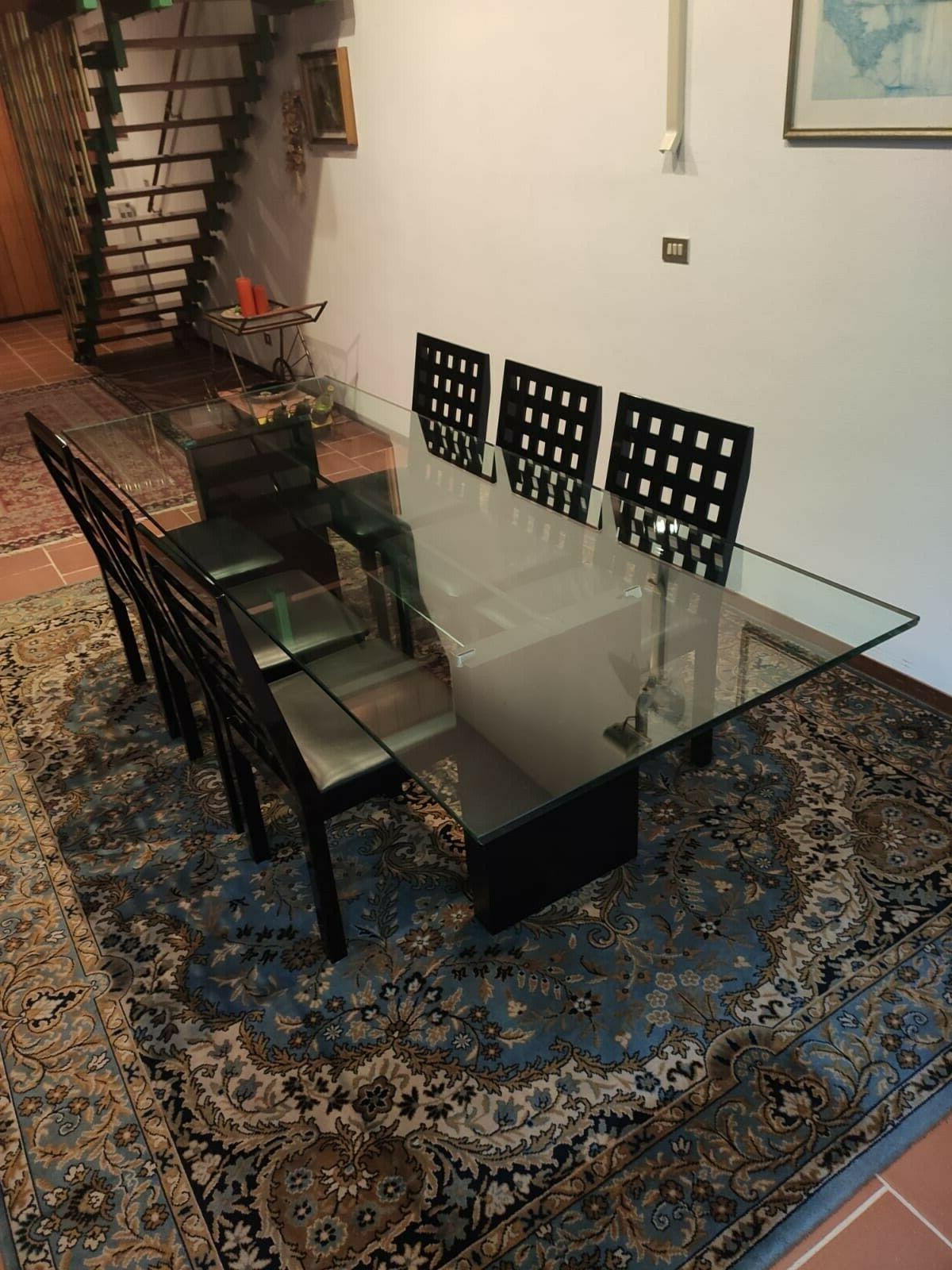 tavolo da pranzo in cristallo con sei