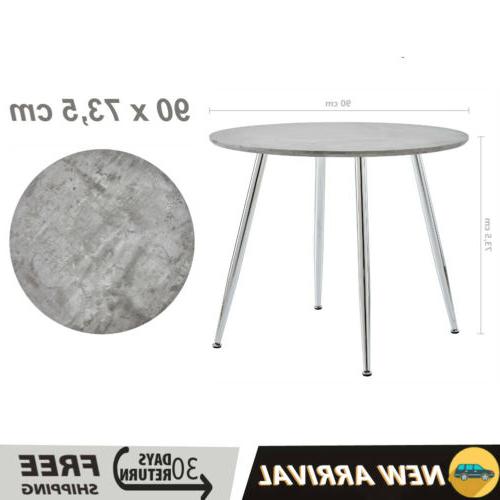 tavolo da pranzo rotondo in cemento e