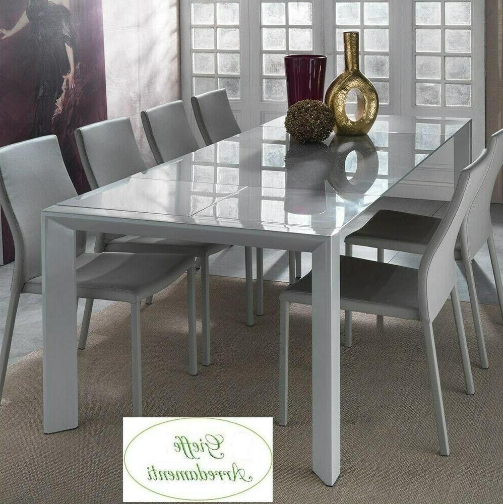 tavolo in acciaio con cristallo doppia allunga