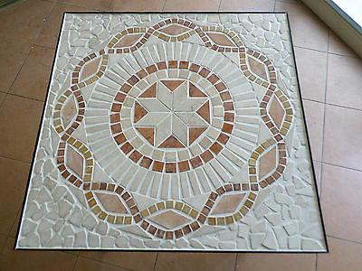 tavolo in ferro battuto con mosaico in