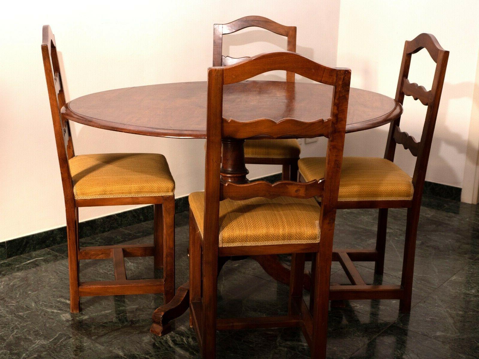 tavolo tondo in legno di noce con